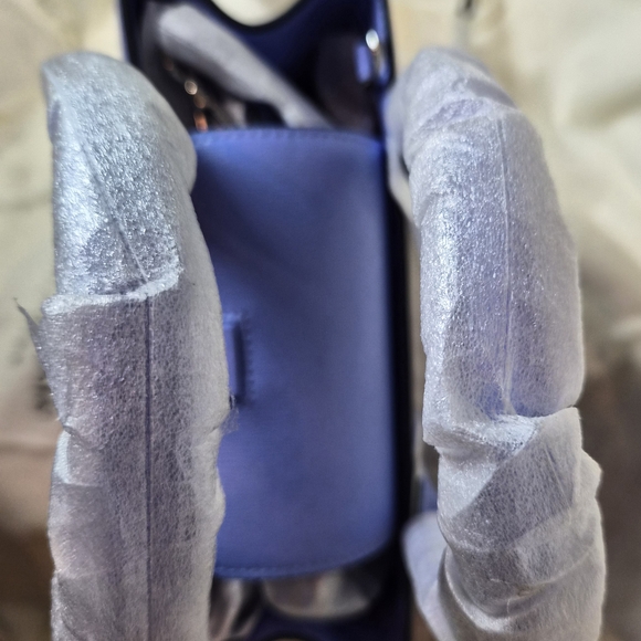 Kate Spade New York

Genie Blue Sam Icon Square Tote - Picture 6 of 14